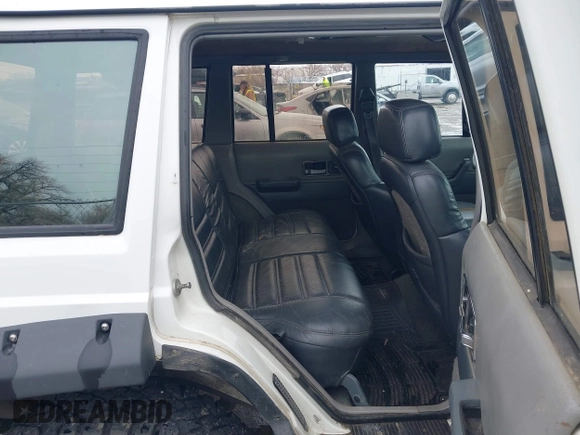 1990 Jeep Cherokee with VIN 1J4FJ78L0LL217723, listed as a IAAI auction lot 41788403 with 147,557 mi miles and . Bid and sale history available at DreamBid. Image 8.