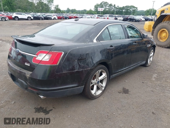 2010 Ford Taurus SHO with VIN 1FAHP2KT7AG132561, listed as a IAAI auction lot 31602484 with 118,333 mi miles and . Bid and sale history available at DreamBid. Image 4.