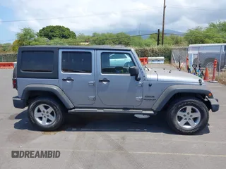 2016 Jeep Wrangler Unlimited Freedom with VIN 1C4BJWDG7GL109953, listed as a IAAI auction lot 42140111 with 24,570 mi miles and . Bid and sale history available at DreamBid. Image 13.