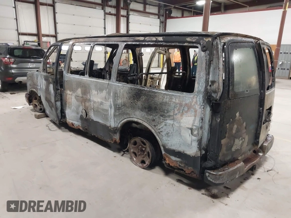 2005 Chevrolet Express Passenger with VIN 1GNFG15T751202874, listed as a IAAI auction lot 42312263 with Not provided miles and . Bid and sale history available at DreamBid. Image 3.