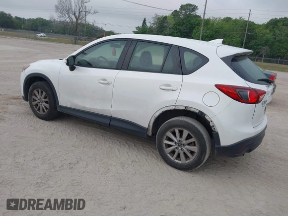 2016 Mazda CX-5 Sport with VIN JM3KE2BY1G0875484, listed as a IAAI auction lot 41838122 with 166,986 mi miles. Bid and sale history available at carsss.com. Image 3.