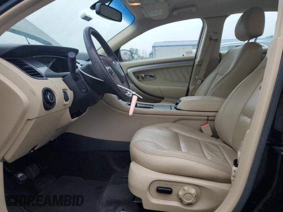 2016 Ford Taurus SEL with VIN 1FAHP2E88GG137607, listed as a Copart auction lot 61356505 with 33,768 mi miles and Salvage title. Bid and sale history available at DreamBid. Image 7.