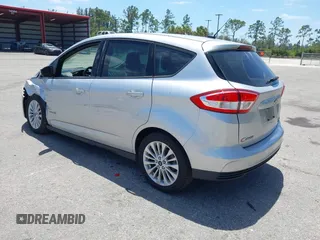 2018 Ford C-Max SE z VIN 1FADP5AU1JL104191, wystawiony jako IAAI lot #42153994 z przebiegiem 132 413 mil mil oraz . Historia ofert i sprzedaży dostępna na DreamBid. Obrazek 3.