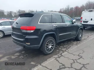 2014 Jeep Grand Cherokee Limited z VIN 1C4RJFBG0EC195654, wystawiony jako IAAI lot #42090257 z przebiegiem 195 615 mil mil oraz . Historia ofert i sprzedaży dostępna na DreamBid. Obrazek 4.