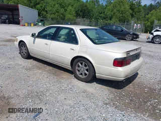 2000 Cadillac Seville Touring STS z VIN 1G6KY5495YU145937, wystawiony jako IAAI lot #42330143 z przebiegiem 217 894 mil mil oraz . Historia ofert i sprzedaży dostępna na DreamBid. Obrazek 3.