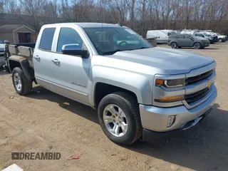 2016 Chevrolet Silverado 1500 LT with VIN 1GCVKREC4GZ125676, listed as a IAAI auction lot 42006237 with 114,699 mi miles. Bid and sale history available at carsss.com. Image 1.