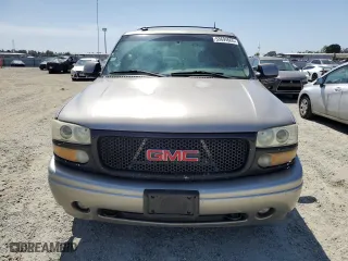 2003 GMC Yukon Denali with VIN 1GKEK63U13J255146, listed as a Copart auction lot 53694665 with 256,523 mi miles and Salvage Title. Bid and sale history available at carsss.com. Image 5.