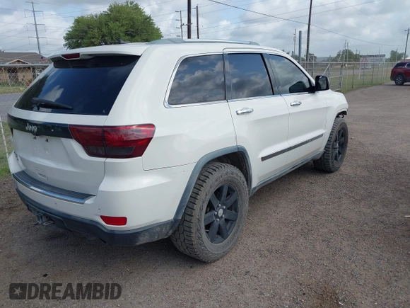 2011 Jeep Grand Cherokee Overland Summit with VIN 1J4RR6GT9BC586712, listed as a IAAI auction lot 42427655 with 157,549 mi miles and . Bid and sale history available at DreamBid. Image 4.