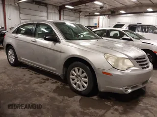 2008 Chrysler Sebring LX with VIN 1C3LC46K58N285060, listed as a IAAI auction lot 42002102 with 156,460 mi miles and . Bid and sale history available at DreamBid. Image 1.