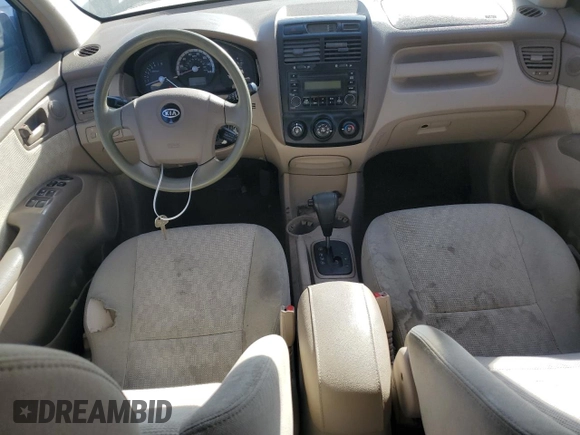 2006 Kia Sportage LX z VIN KNDJF724967294171, wystawiony jako Copart lot #75556994 z przebiegiem 141 868 mil mil oraz Szkoda całkowita • Salvage title. Historia ofert i sprzedaży dostępna na DreamBid. Obrazek 8.