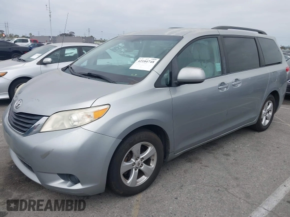 2011 Toyota Sienna LE AAS with VIN 5TDKK3DC0BS119045, listed as a IAAI auction lot 42184748 with 196,607 mi miles. Bid and sale history available at carsss.com. Image 2.