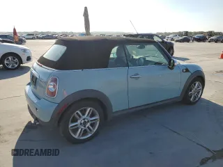 2013 MINI Convertible z VIN WMWZN3C57DT569379, wystawiony jako Copart lot #71982954 z przebiegiem 152 142 mil mil oraz Czysty tytuł • Clean title. Historia ofert i sprzedaży dostępna na DreamBid. Obrazek 3.