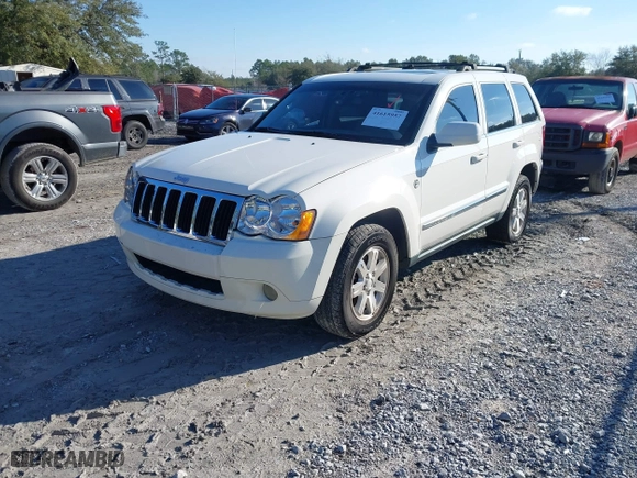 2009 Jeep Grand Cherokee Limited with VIN 1J8HR58P89C513900, listed as a IAAI auction lot 41615957 with 152,119 mi miles. Bid and sale history available at carsss.com. Image 2.