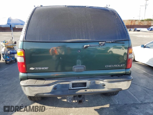 2003 Chevrolet Tahoe LS with VIN 1GNEC13V53R101245, listed as a Copart auction lot 65222214 with 259,040 mi miles and Salvage Title. Bid and sale history available at carsss.com. Image 6.