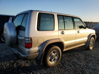 2002 Isuzu Trooper S z VIN JACDS58X627J11588, wystawiony jako Copart lot #76932404 z przebiegiem Nie podano mil oraz Szkody całkowita. Historia ofert i sprzedaży dostępna na DreamBid. Obrazek 3.