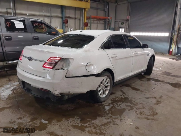 2014 Ford Taurus SE with VIN 1FAHP2D87EG182990, listed as a IAAI auction lot 41582146 with 125579 miles. Bid and sale history available at carsss.com. Image 4.