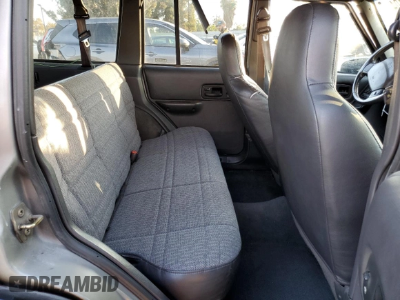 2001 Jeep Cherokee Sport with VIN 1J4FT48S51L568981, listed as a Copart auction lot 82471104 with 181,870 mi miles and Salvage Title. Bid and sale history available at carsss.com. Image 11.
