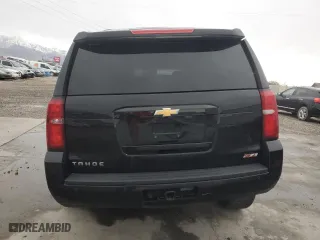 2019 Chevrolet Tahoe LT with VIN 1GNSKBKC7KR306530, listed as a Copart auction lot 42024765 with 122,249 mi miles and Salvage Title. Bid and sale history available at carsss.com. Image 6.