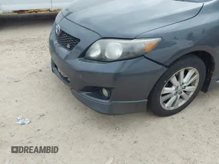 2009 Toyota Corolla with VIN 2T1BU40E99C107244, listed as a IAAI auction lot 42167737 with 164,550 mi miles. Bid and sale history available at carsss.com. Image 6.