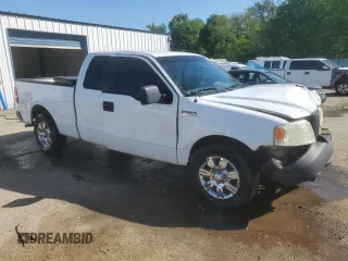 2007 Ford F-150 STX with VIN 1FTRX12W37NA05703, listed as a Copart auction lot 51927885 with 206,593 mi miles and Salvage Title. Bid and sale history available at DreamBid. Image 4.