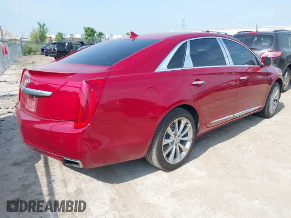2013 Cadillac XTS Luxury z VIN 2G61P5S34D9139924, wystawiony jako IAAI lot #42504191 z przebiegiem 140 744 mil mil oraz . Historia ofert i sprzedaży dostępna na DreamBid. Obrazek 4.