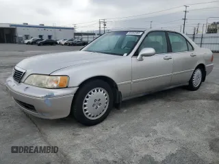 1997 Acura RL w/Navigation System z VIN JH4KA9663VC003131, wystawiony jako Copart lot #55392965 z przebiegiem Nie podano mil oraz Czysty tytuł • Clean title. Historia ofert i sprzedaży dostępna na DreamBid. Obrazek 1.