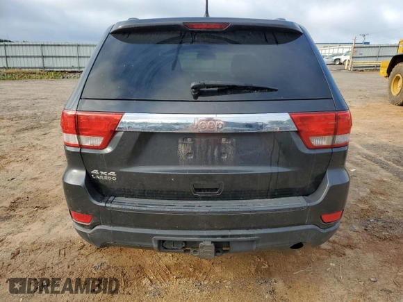 2011 Jeep Grand Cherokee Laredo z VIN 1J4RR4GG0BC518726, wystawiony jako Copart lot #58985765 z przebiegiem 163 625 mil mil oraz Szkoda całkowita • Salvage title. Historia ofert i sprzedaży dostępna na DreamBid. Obrazek 6.
