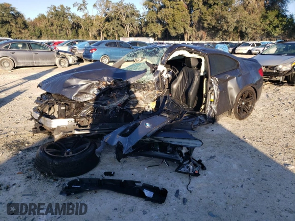 2018 BMW M2 z VIN WBS1J5C50J7B70191, wystawiony jako Copart lot #86976284 z przebiegiem Nie podano mil oraz Szkoda całkowita • Salvage title. Historia ofert i sprzedaży dostępna na DreamBid. Obrazek 1.
