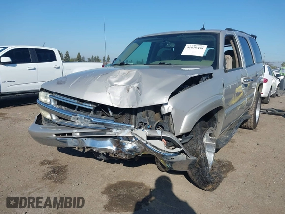 2004 Chevrolet Tahoe LS with VIN 1GNEC13T64J282970, listed as a IAAI auction lot 41879458 with 205,952 mi miles and . Bid and sale history available at DreamBid. Image 2.