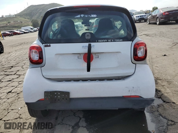 2016 Smart fortwo Passion z VIN WMEFJ5DA4GK141225, wystawiony jako Copart lot #48356965 z przebiegiem 65 928 mil mil oraz Szkody całkowita. Historia ofert i sprzedaży dostępna na DreamBid. Obrazek 6.