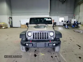 2018 Jeep Wrangler Unlimited Rubicon Recon z VIN 1C4HJWFG3JL830219, wystawiony jako Copart lot #47385325 z przebiegiem 121 679 mil mil oraz Szkoda całkowita • Salvage title. Historia ofert i sprzedaży dostępna na DreamBid. Obrazek 11.