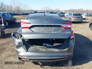 2017 Ford Fusion SE z VIN 3FA6P0HDXHR321008, wystawiony jako IAAI lot #41620779 z przebiegiem 110 116 mil mil oraz . Historia ofert i sprzedaży dostępna na DreamBid. Obrazek 16.