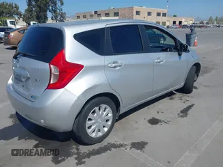 2015 Nissan Note SV with VIN 3N1CE2CP3FL421485, listed as a IAAI auction lot 42217326 with 110,525 mi miles and . Bid and sale history available at DreamBid. Image 4.