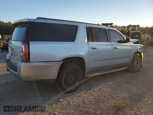 2015 GMC Yukon XL SLE z VIN 1GKS1GKC7FR285469, wystawiony jako Copart lot #81177424 z przebiegiem Nie podano mil oraz Czysty tytuł • Clean title. Historia ofert i sprzedaży dostępna na DreamBid. Obrazek 3.