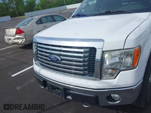 2012 Ford F-150 XL with VIN 1FTFX1EF1CFB32694, listed as a IAAI auction lot 42048993 with 144,091 mi miles. Bid and sale history available at carsss.com. Image 12.