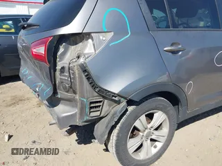 2013 Kia Sportage LX with VIN KNDPB3A21D7486860, listed as a IAAI auction lot 42049450 with 177,059 mi miles and . Bid and sale history available at DreamBid. Image 13.