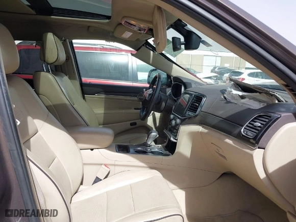 2020 Jeep Grand Cherokee Overland with VIN 1C4RJECG8LC323824, listed as a IAAI auction lot 41757922 with 64,792 mi miles. Bid and sale history available at carsss.com. Image 5.