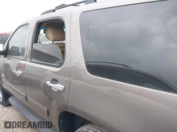 2014 Chevrolet Tahoe LT with VIN 1GNSCBE08ER106419, listed as a IAAI auction lot 41789896 with 99,420 mi miles and . Bid and sale history available at DreamBid. Image 14.