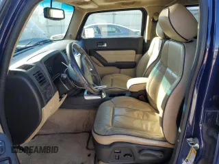 2009 Hummer H3 Luxury with VIN 5GTEN13E098116018, listed as a Copart auction lot 83461044 with 242,660 mi miles and Salvage Title. Bid and sale history available at DreamBid. Image 7.