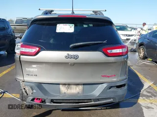 2017 Jeep Cherokee Trailhawk L Plus with VIN 1C4PJMBB6HW654172, listed as a IAAI auction lot 41851236 with 104,263 mi miles. Bid and sale history available at carsss.com. Image 16.