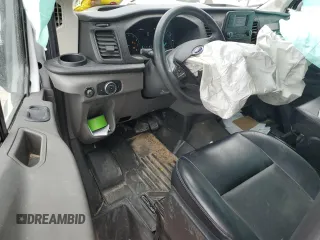 2020 Ford Transit Cargo with VIN 1FTBR1Y88LKB60893, listed as a Copart auction lot 71268874 with 69,359 mi miles and Salvage Title. Bid and sale history available at DreamBid. Image 8.