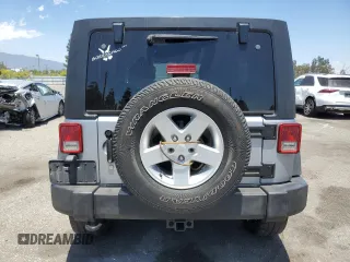 2014 Jeep Wrangler Unlimited Sport with VIN 1C4HJWDG1EL221302, listed as a Copart auction lot 63331015 with 213,912 mi miles and Salvage title. Bid and sale history available at DreamBid. Image 6.