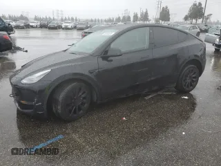 2023 Tesla Model Y Long Range z VIN 7SAYGDEE1PA074971, wystawiony jako Copart lot #45035265 z przebiegiem 44 844 mil mil oraz Szkody całkowita. Historia ofert i sprzedaży dostępna na DreamBid. Obrazek 1.