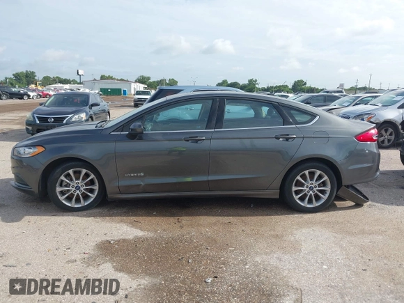 2017 Ford Fusion Hybrid SE with VIN 3FA6P0LU5HR336779, listed as a IAAI auction lot 42691789 with 140,720 mi miles and . Bid and sale history available at DreamBid. Image 14.