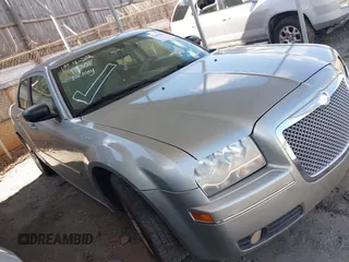 2006 Chrysler 300 Touring with VIN 2C3KA53G06H164188, listed as a IAAI auction lot 42079830 with 165,321 mi miles. Bid and sale history available at carsss.com. Image 1.