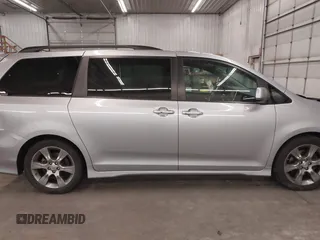 2015 Toyota Sienna SE with VIN 5TDXK3DC9FS527667, listed as a IAAI auction lot 41977729 with 230,933 mi miles and . Bid and sale history available at DreamBid. Image 14.