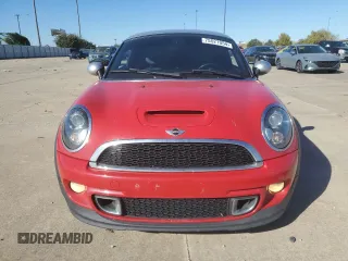 2012 MINI Coupe S z VIN WMWSX3C53CT155140, wystawiony jako Copart lot #75521054 z przebiegiem 65 628 mil mil oraz Szkody całkowita. Historia ofert i sprzedaży dostępna na DreamBid. Obrazek 5.