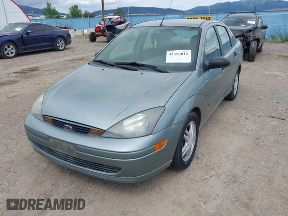 2003 Ford Focus SE z VIN 1FAFP34PX3W135265, wystawiony jako IAAI lot #42354012 z przebiegiem 79 617 mil mil oraz . Historia ofert i sprzedaży dostępna na DreamBid. Obrazek 6.