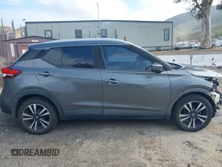 2019 Nissan Kicks SR with VIN 3N1CP5CU9KL483310, listed as a IAAI auction lot 41885087 with 128,055 mi miles. Bid and sale history available at carsss.com. Image 14.