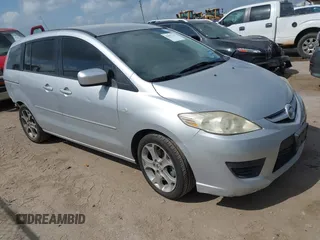 2009 Mazda 5 Sport with VIN JM1CR293090355422, listed as a IAAI auction lot 42567279 with 214,402 mi miles and . Bid and sale history available at DreamBid. Image 1.